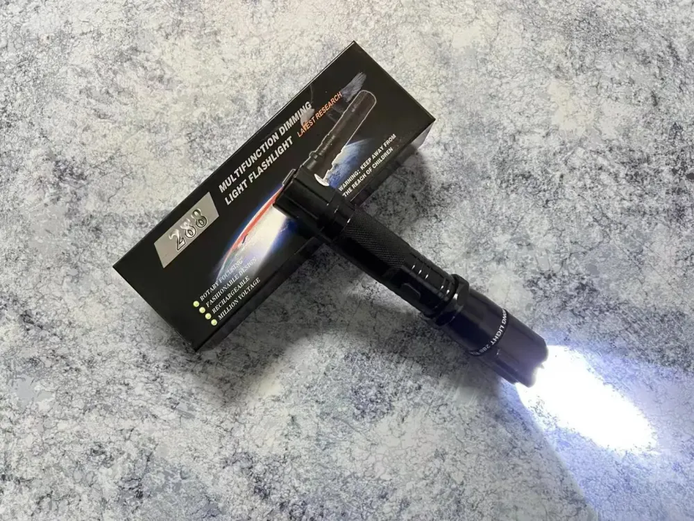 Baterijska lampa sa laserom i elektro sokerom